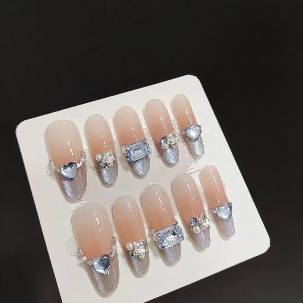 Faux Ongles Longs Ovales Bleu Ambre Œil de Chat French Manucure Strass
