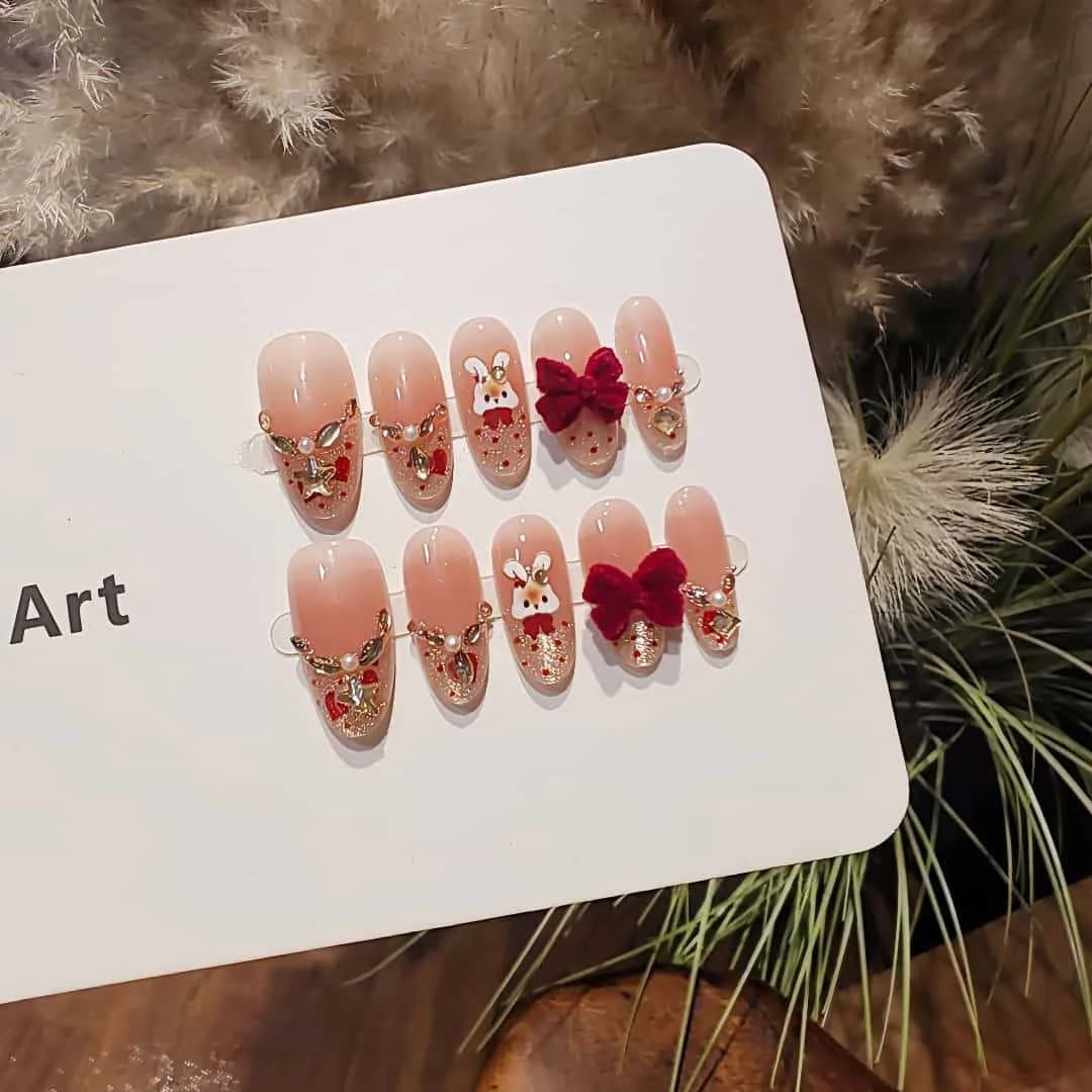 Faux Ongles Œil de Chat French Tip avec Strass et Nœud