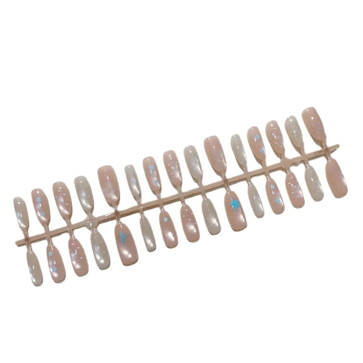 Faux ongles effet œil de chat pêche clair motif étoilé 30 pièces