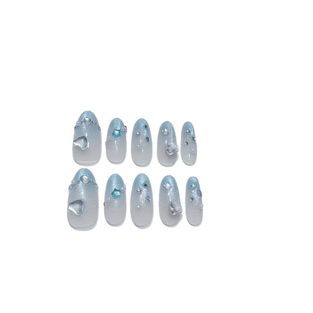 Faux ongles œil de chat dégradé bleu avec strass