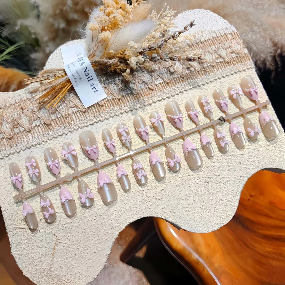 Faux ongles papillon rose œil de chat paillettes nœud