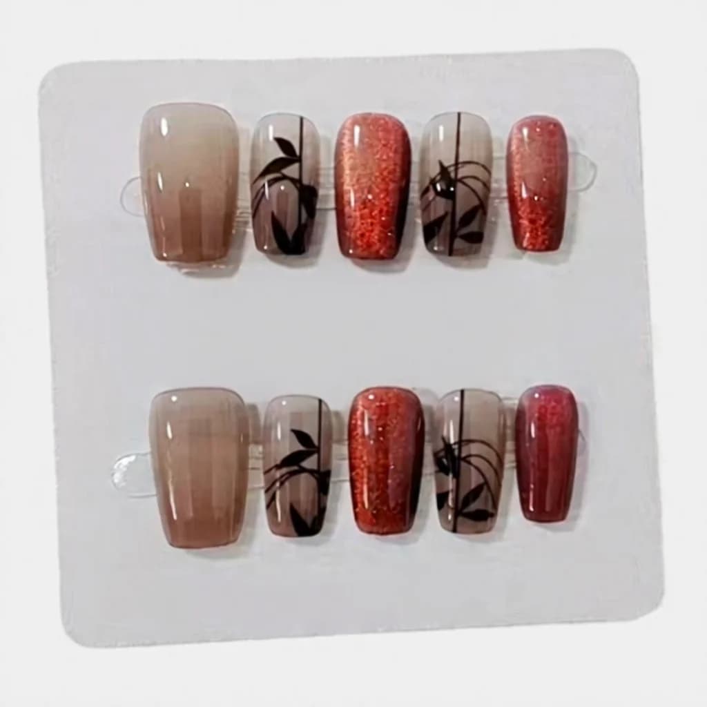 Faux ongles carrés courts rouges, effet œil de chat bambou et paillettes
