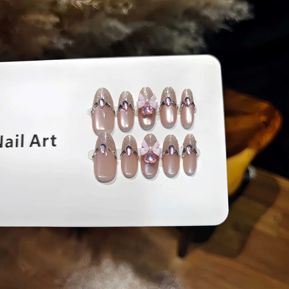 Faux Ongles à Presser Roses Effet Œil de Chat avec Paillettes et Nœud