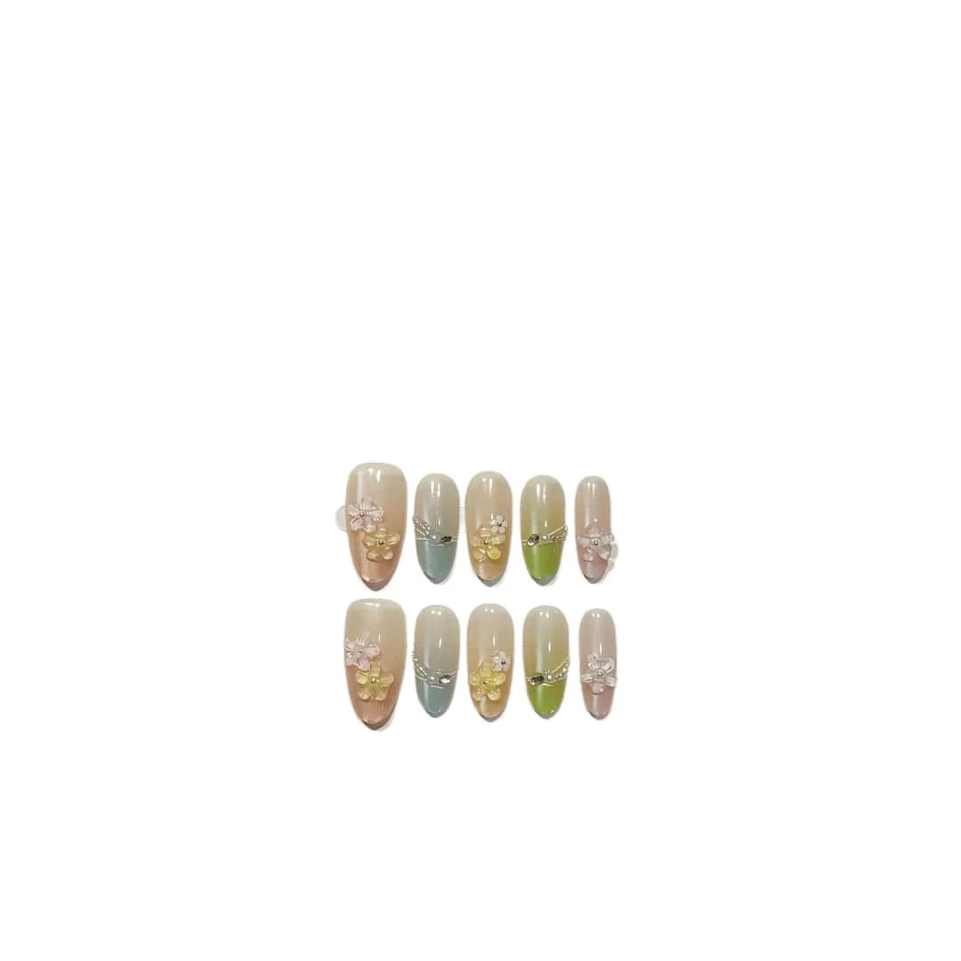 Faux ongles œil de chat floral avec perles et strass
